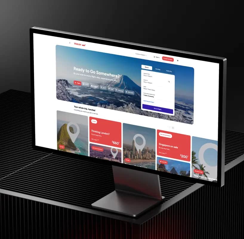 A desktop monitor showing the Webjet website